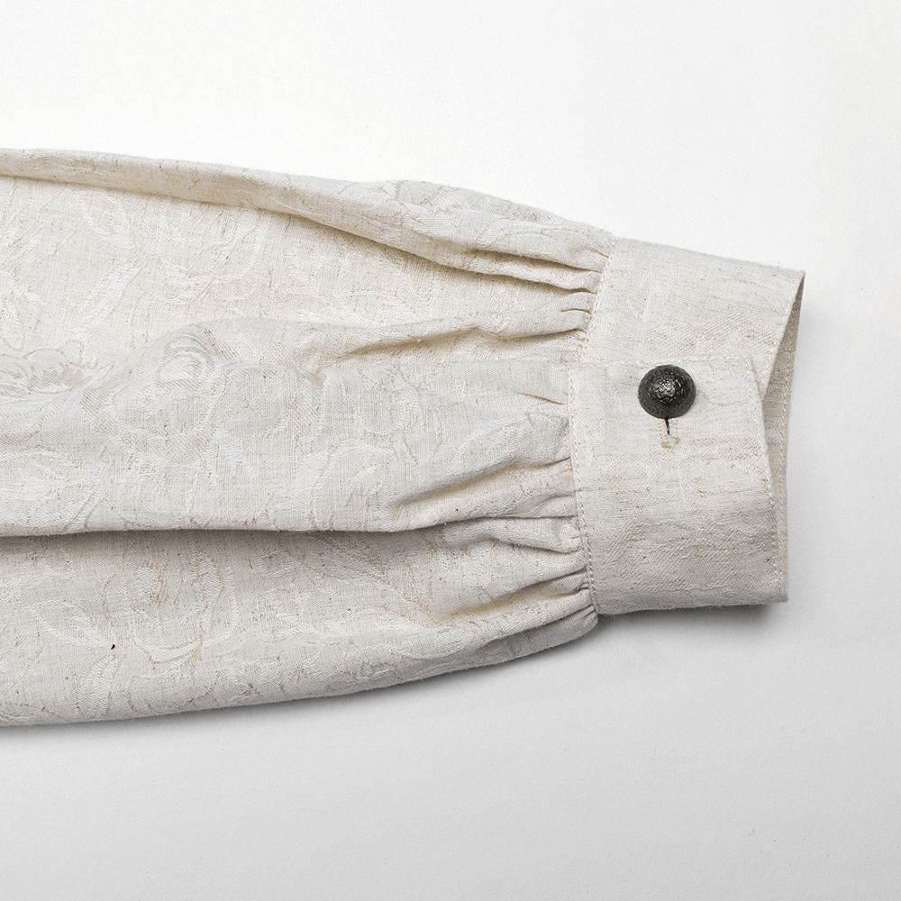 Close-up of a sleeve of a gothic linen shirt for men, featuring hand-sewn buttons and elegant fabric texture.