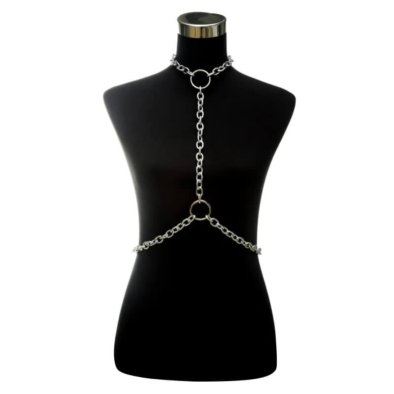 Stylish gothic chain jewelry body harness on mannequin, featuring metal rings and sexy design for fashion-forward women.