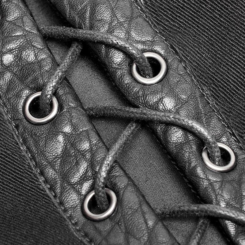 Close-up of chest protector vest showing adjustable side lacing and metallic eyelets for a secure fit.