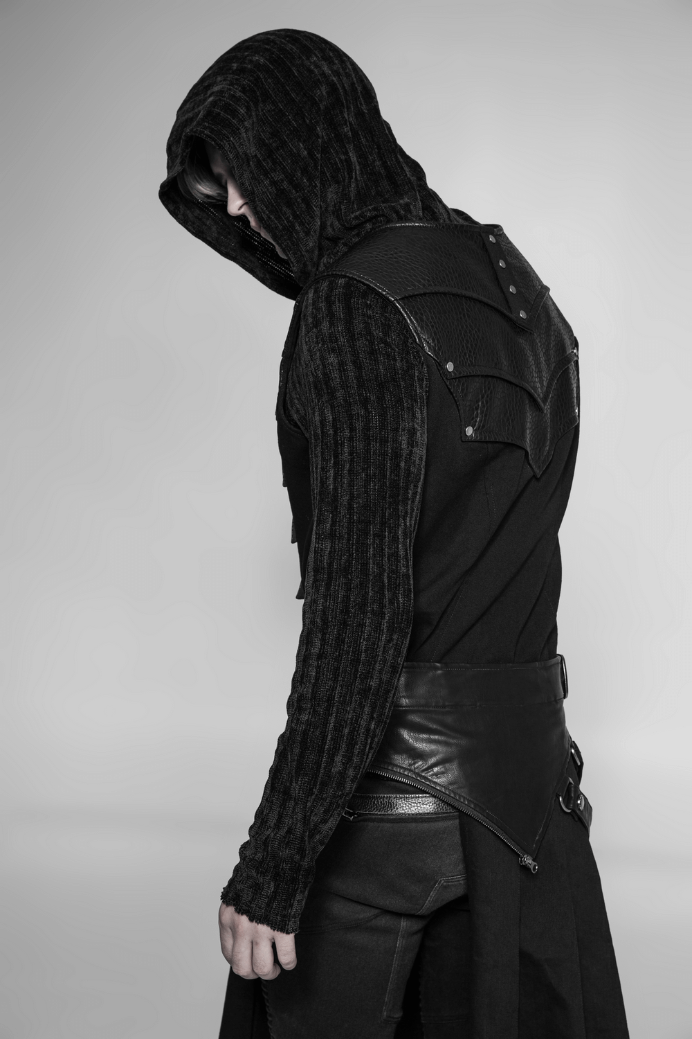 Stylish chest protector vest with adjustable lacing and zipper, featuring a unique bat-wing design.