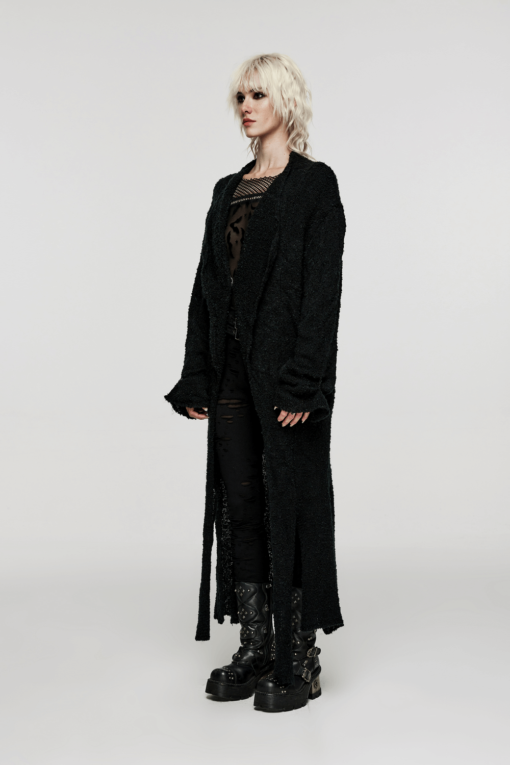 Chic asymmetric wool-blend long cardigan for edgy style and comfort, featuring a flattering silhouette and relaxed fit.