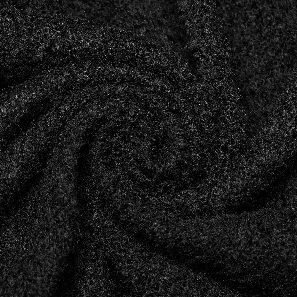 Close-up of luxurious black wool blend fabric, showcasing its soft texture ideal for stylish cardigans.