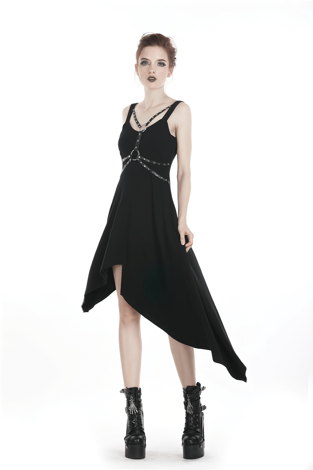 Chic black asymmetrical dress with strap and chain detailing, perfect for edgy evening outings.