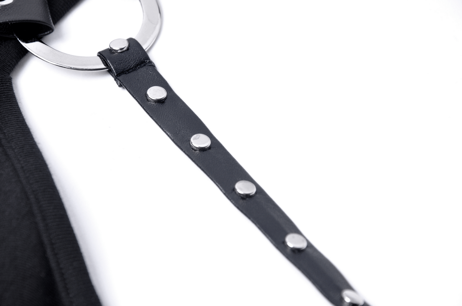 Close-up of black strap with silver chain detailing, showcasing edgy design elements of chic asymmetrical dress.