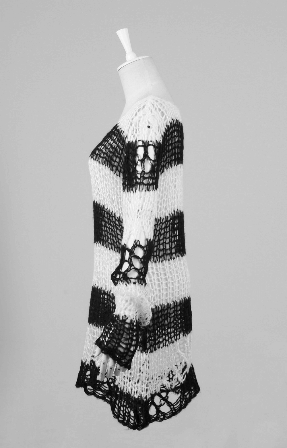 Chic black and white striped long sweater showcasing unique knit pattern and cozy style for modern fashionistas.