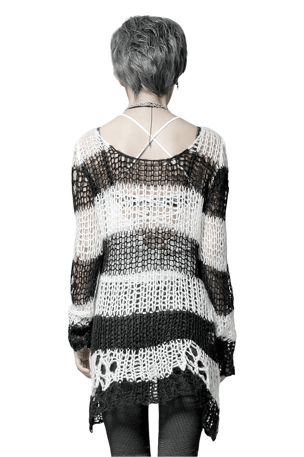 Chic black and white striped long sweater with holes, perfect for stylish occasions and cozy evenings.