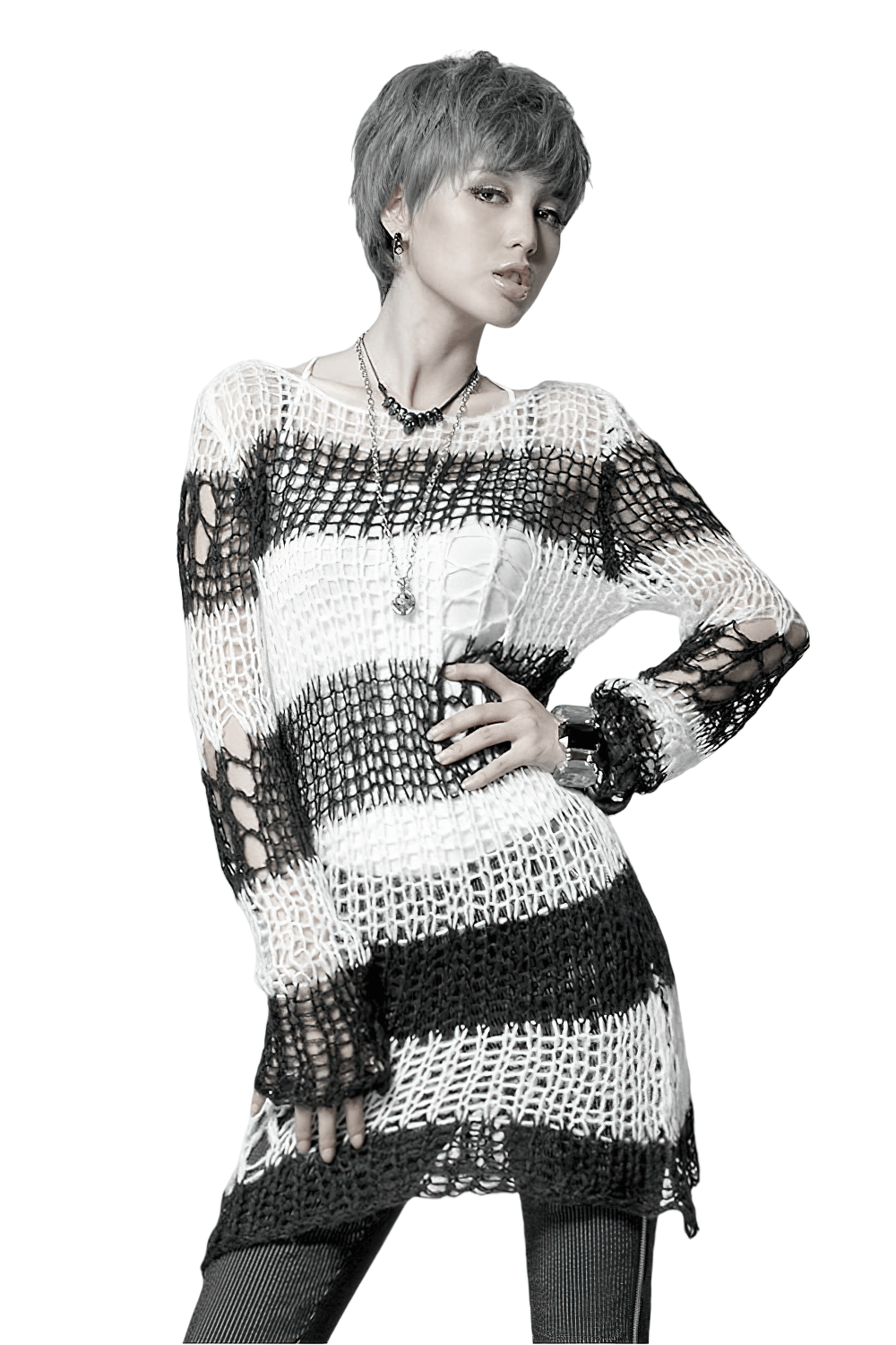 Chic black and white striped long sweater with holes, perfect for fashionistas seeking modern style.