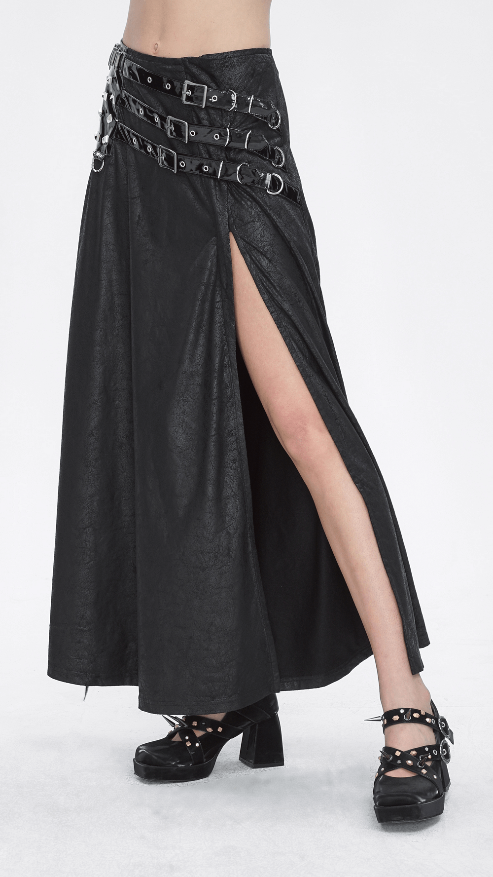 Chic black faux leather long skirt with buckled straps and thigh-high slit, perfect for edgy gothic outfits.