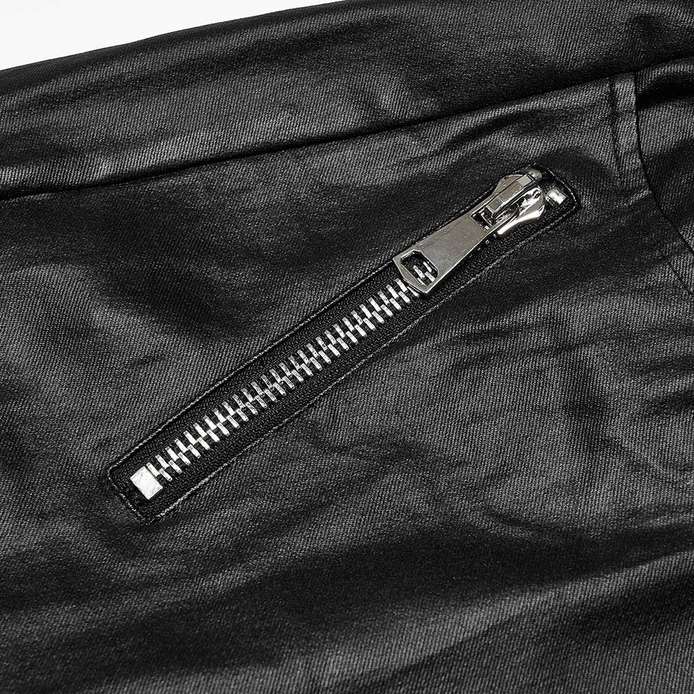 Close-up of a stylish black faux leather skinny pant featuring a shiny zipper detail for punk fashion.