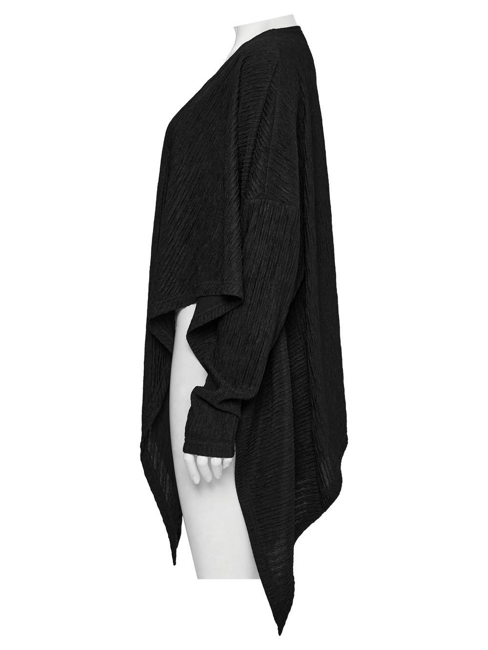 Chic black knit fashion cape for women, featuring a stylish irregular hem and dynamic fit for layering.