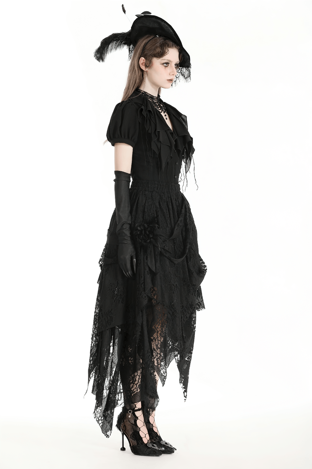 Model showcases an asymmetrical black lace gothic skirt, layered design, combined with elegant accessory, perfect for edgy styling.