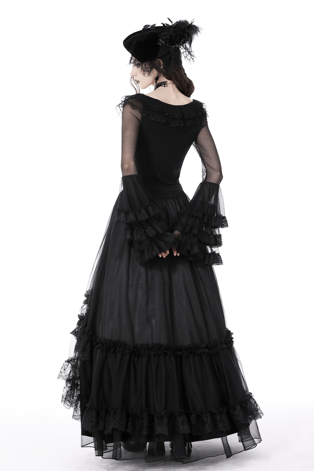 Chic black lace bell sleeved top with sheer mesh details and ruffled cuffs, perfect for gothic fashion enthusiasts.