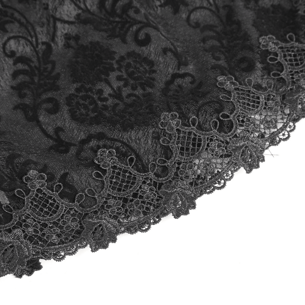 Close-up of elegant black lace featuring intricate floral patterns and scalloped edges for a gothic touch.