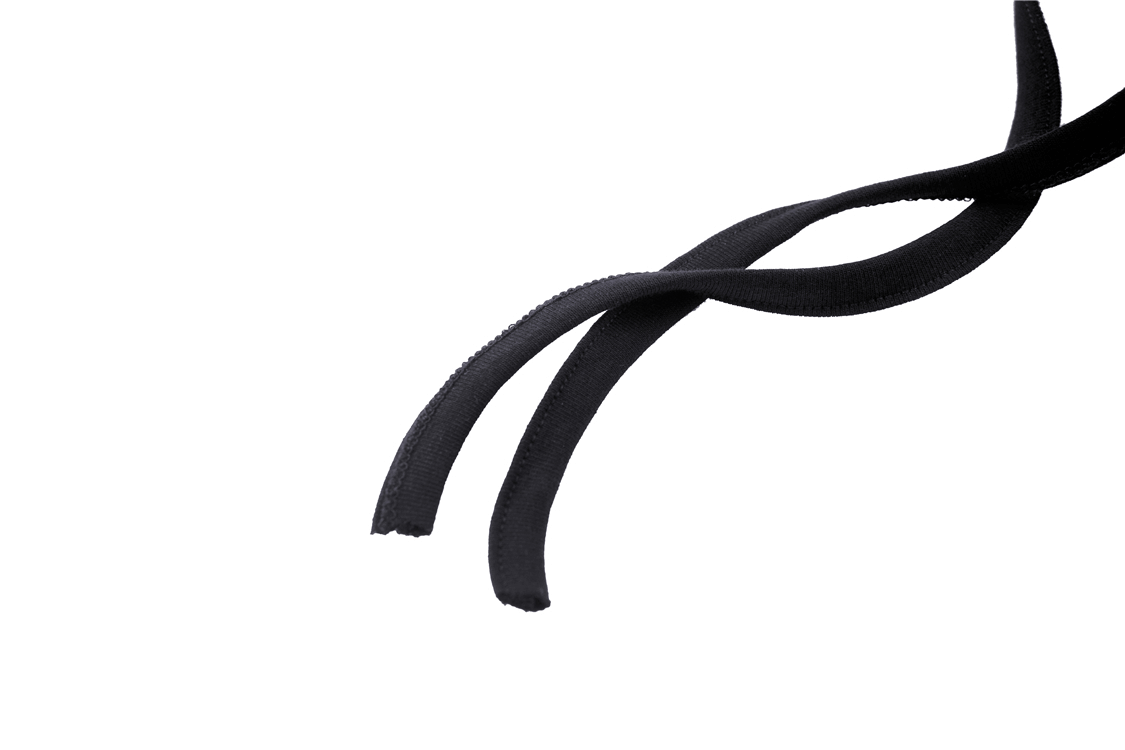Close-up of stylish black ribbon laces, perfect for adding a chic touch to fashion looks.