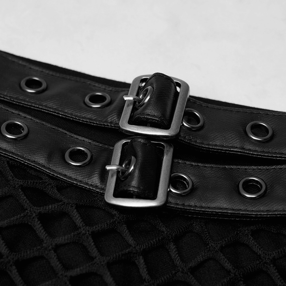 Close-up of chic black mesh skirt buckles and eyelets, showcasing stylish design with adjustable roller buttons.