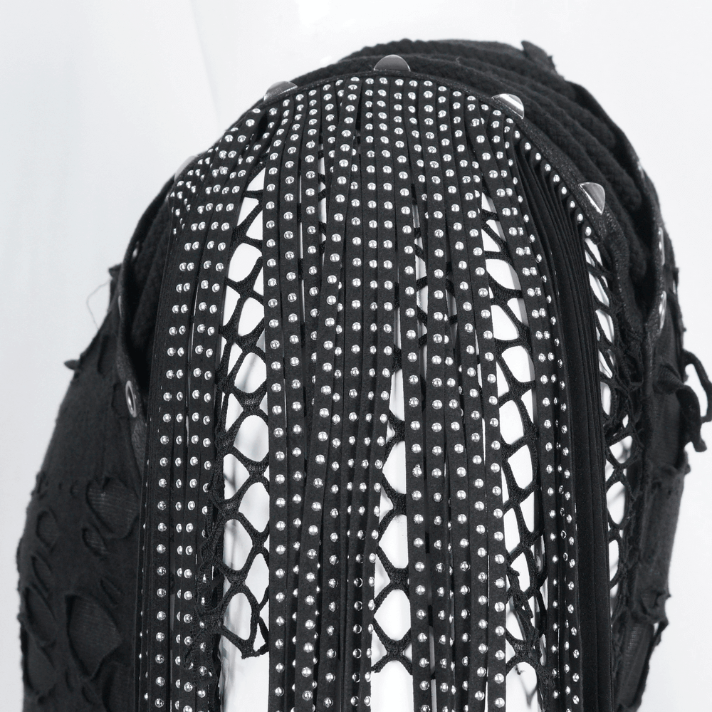 Close-up of chic black mesh t-shirt with fringe detailing and silver studs, perfect for edgy street style.
