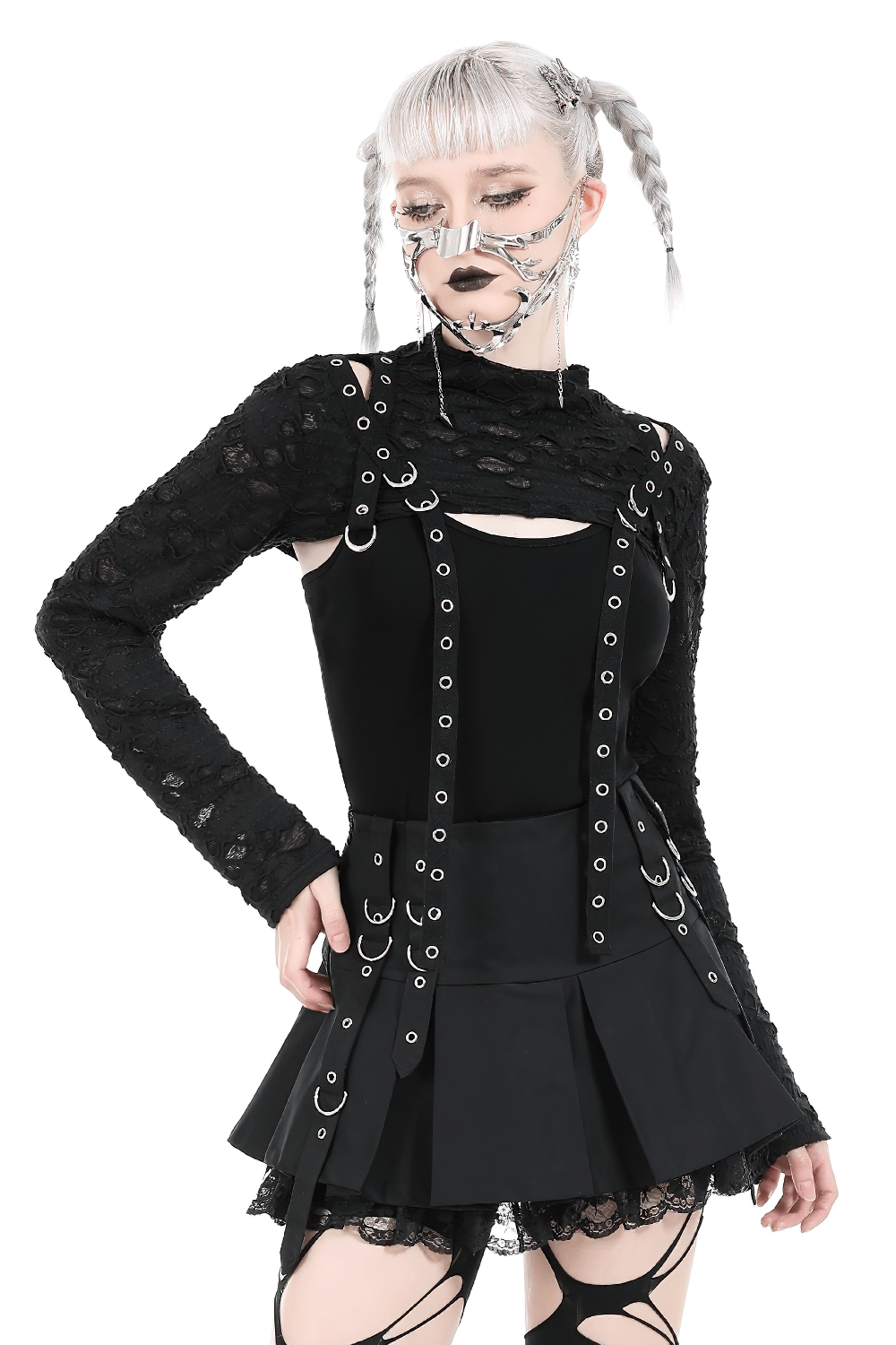 Chic black ripped crop top with metal accents, featuring lace sleeves and harness details, perfect for bold fashion statements.