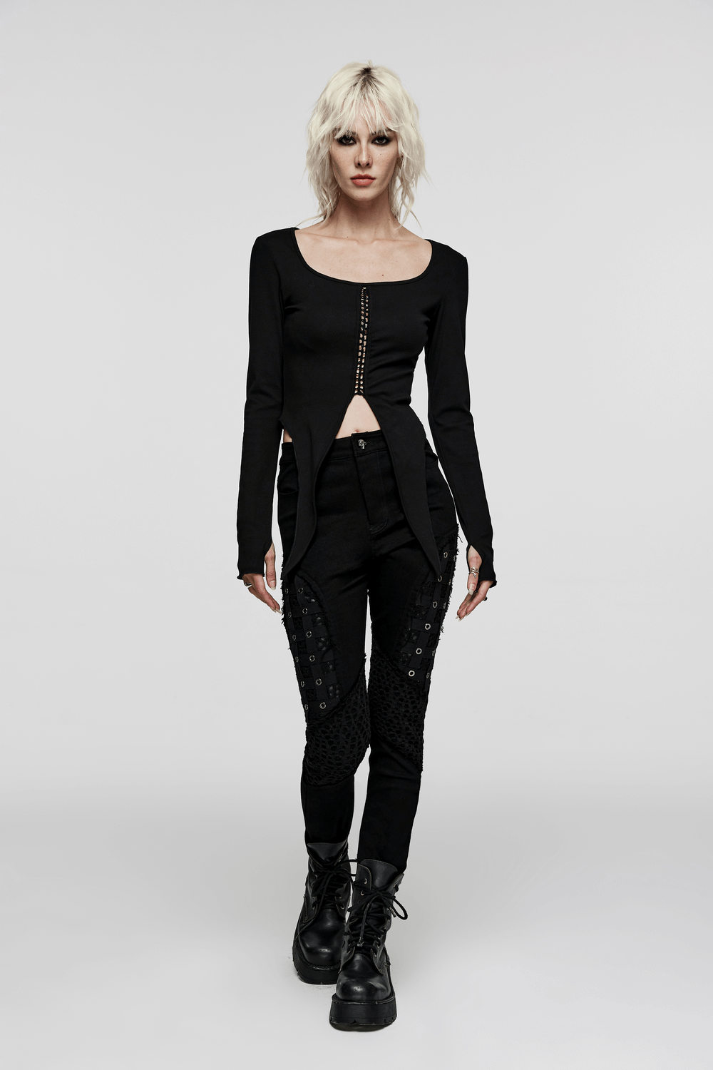 Chic black rubberized mesh punk skinny pants for women with edgy design and slim fit.