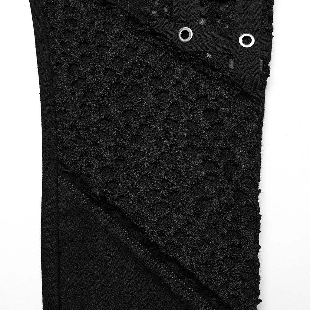 Close-up of black rubberized mesh panel on punk skinny pants featuring geometric eyelet webbing for women.