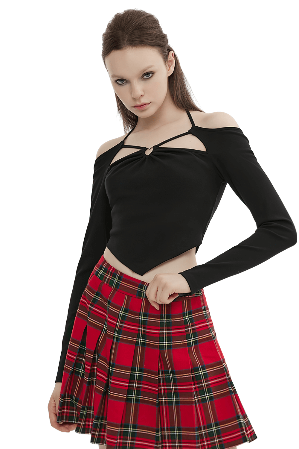 Model wearing a stylish black off-the-shoulder top paired with a red plaid skirt, showcasing modern gothic fashion.