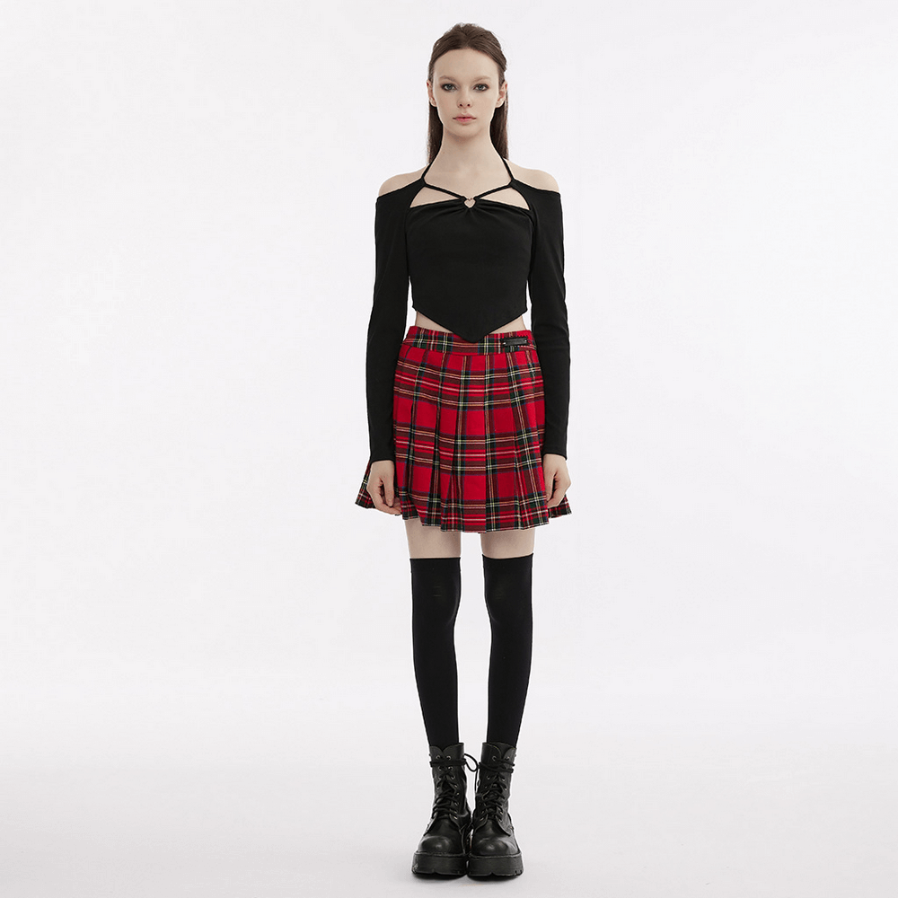 Gothic black off-the-shoulder top with plaid skirt and knee-high socks for a stylish night out.