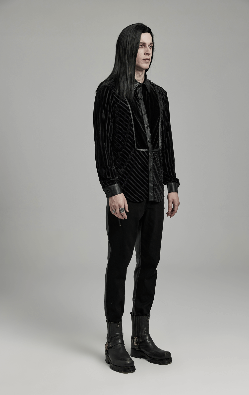 Chic black tactical striped velvet men's shirt with long sleeves, paired with stylish boots for a modern look.