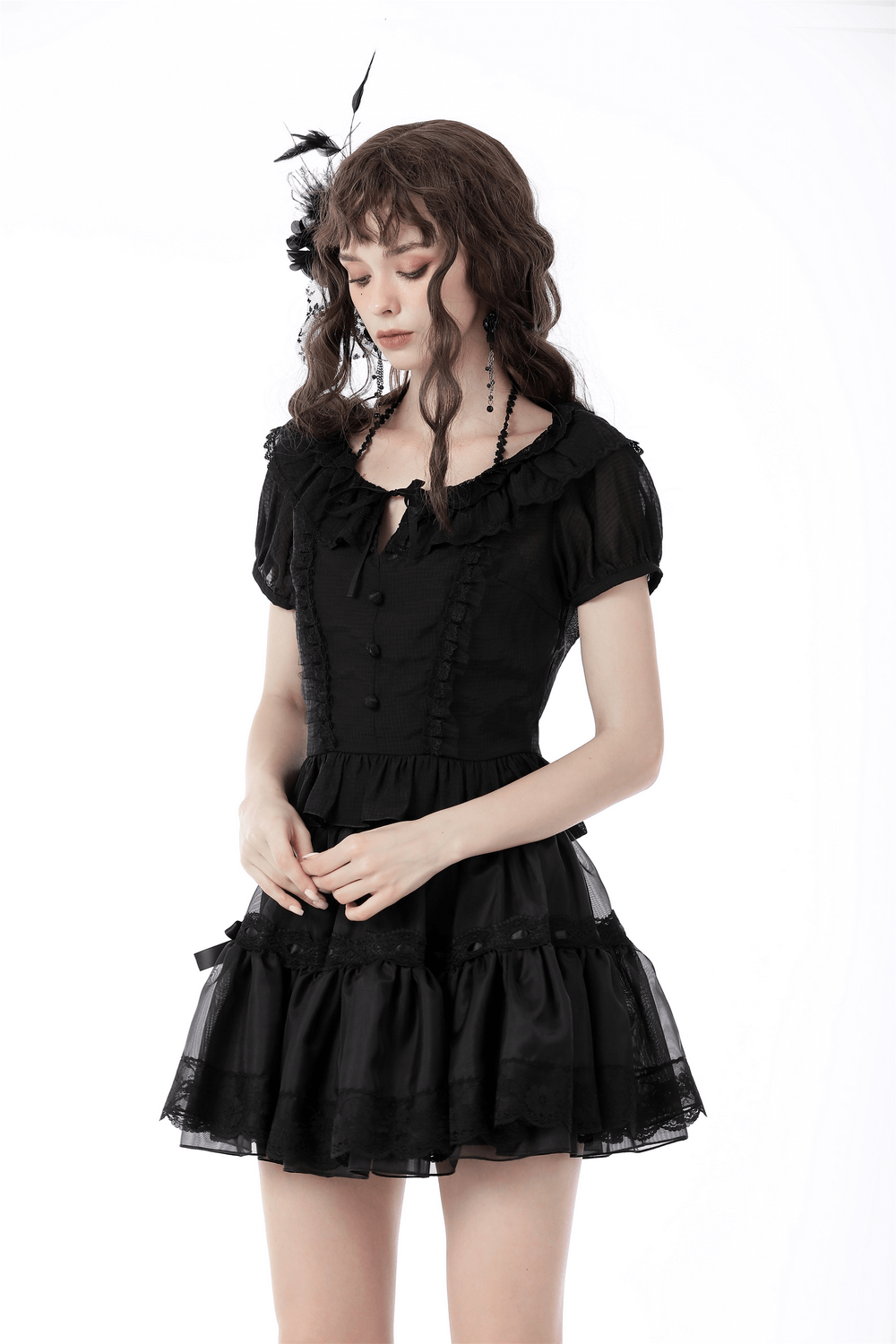 Chic black Victorian ruffle top with puff sleeves and lace accents, perfect for gothic Lolita fashion.