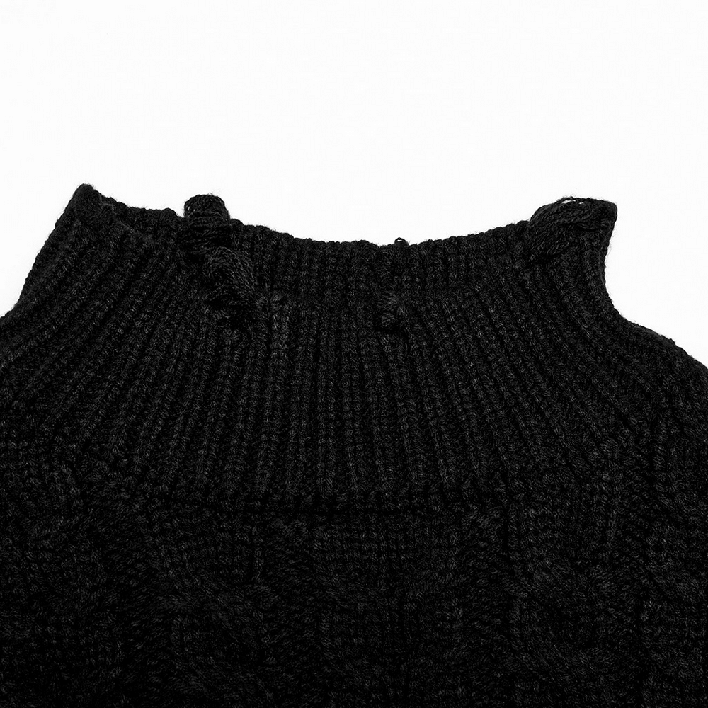 Close-up of the elegant black cropped knit turtleneck sweater for women, showcasing its stylish collar and knit texture.