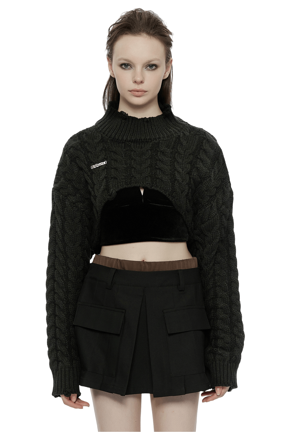 Chic cropped black knit turtleneck sweater for women paired with a stylish skirt, perfect for a trendy outfit.