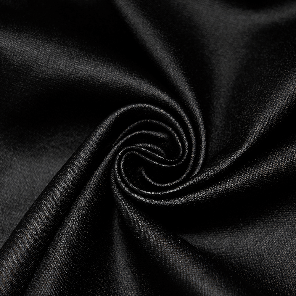 Close-up of luxurious black faux leather fabric, showcasing its smooth texture and shine.
