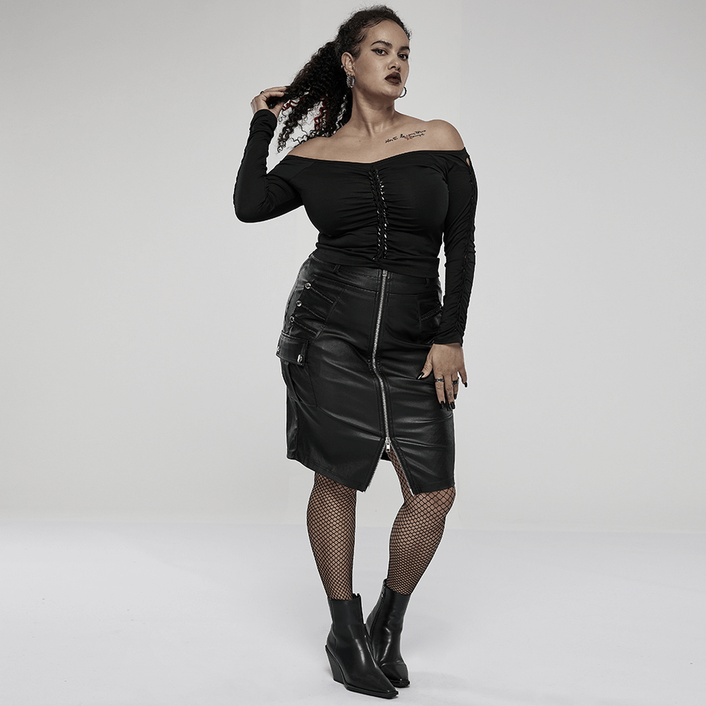 Confident model showcasing a chic black faux leather zippered skirt and off-shoulder top for an edgy punk look.