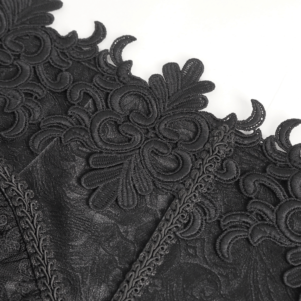 Close-up of elegant black lace with intricate floral embroidery, showcasing vintage charm for a seductive underbust corset.