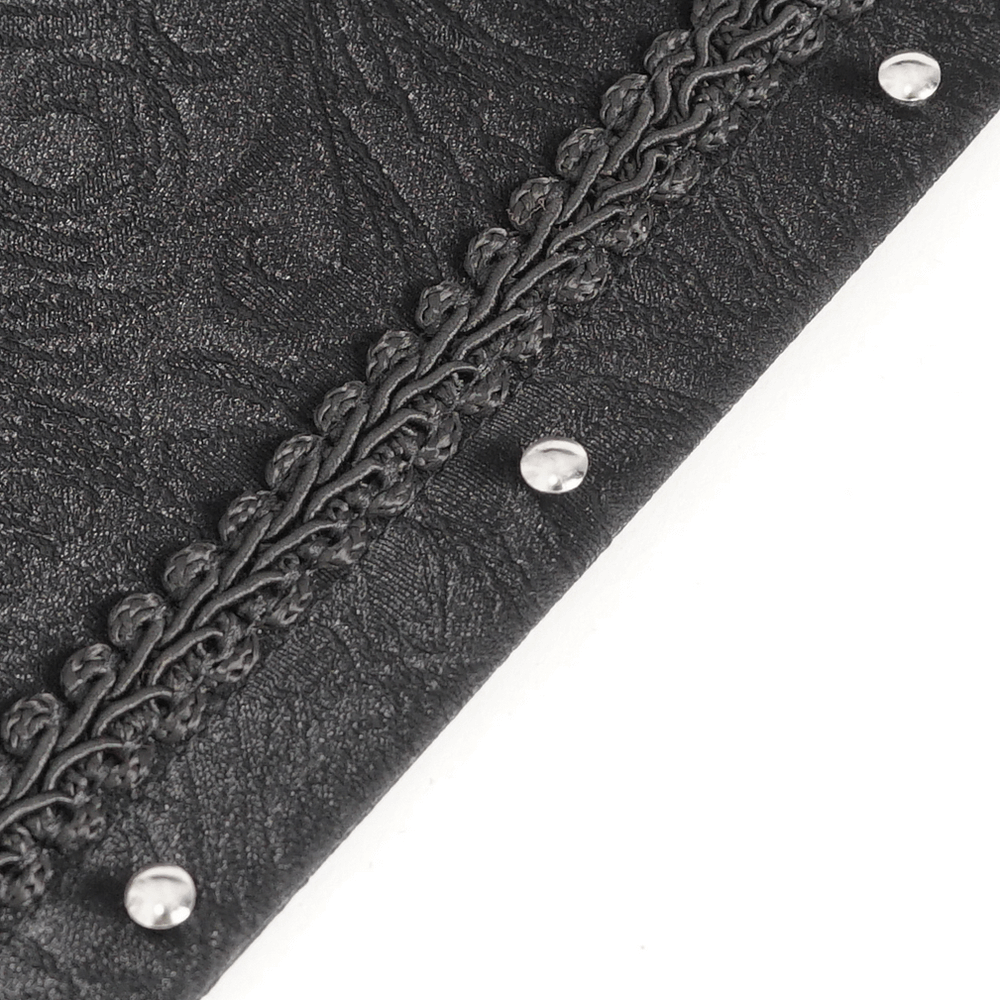 Close-up of elegant black lace underbust corset detail with hook closure and floral embroidery.