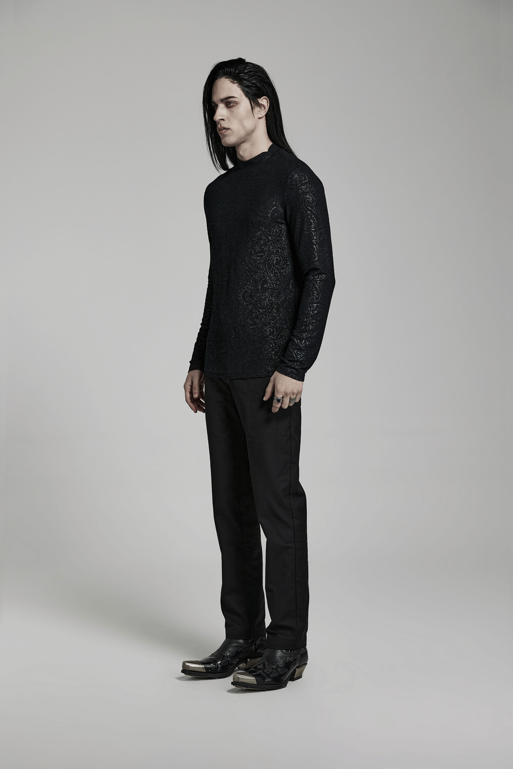 Chic Goth Daily Top in stretch jersey with mock turtleneck, modeled by a male model in all-black attire.
