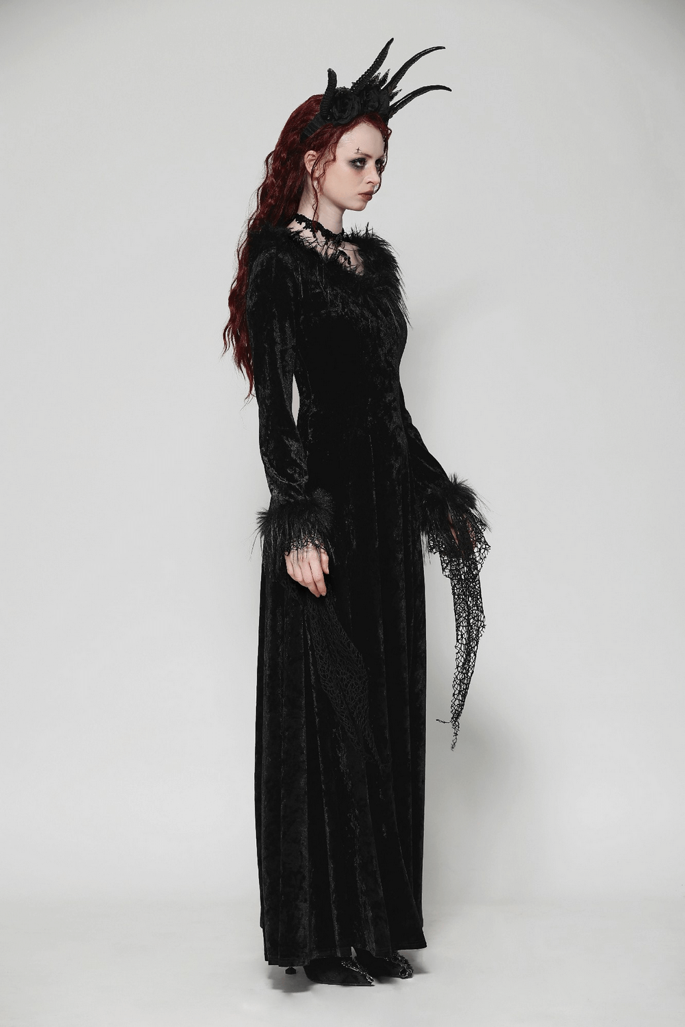 Chic goth velvet maxi dress with lace accents and dramatic details, perfect for gothic events and bold fashion statements.