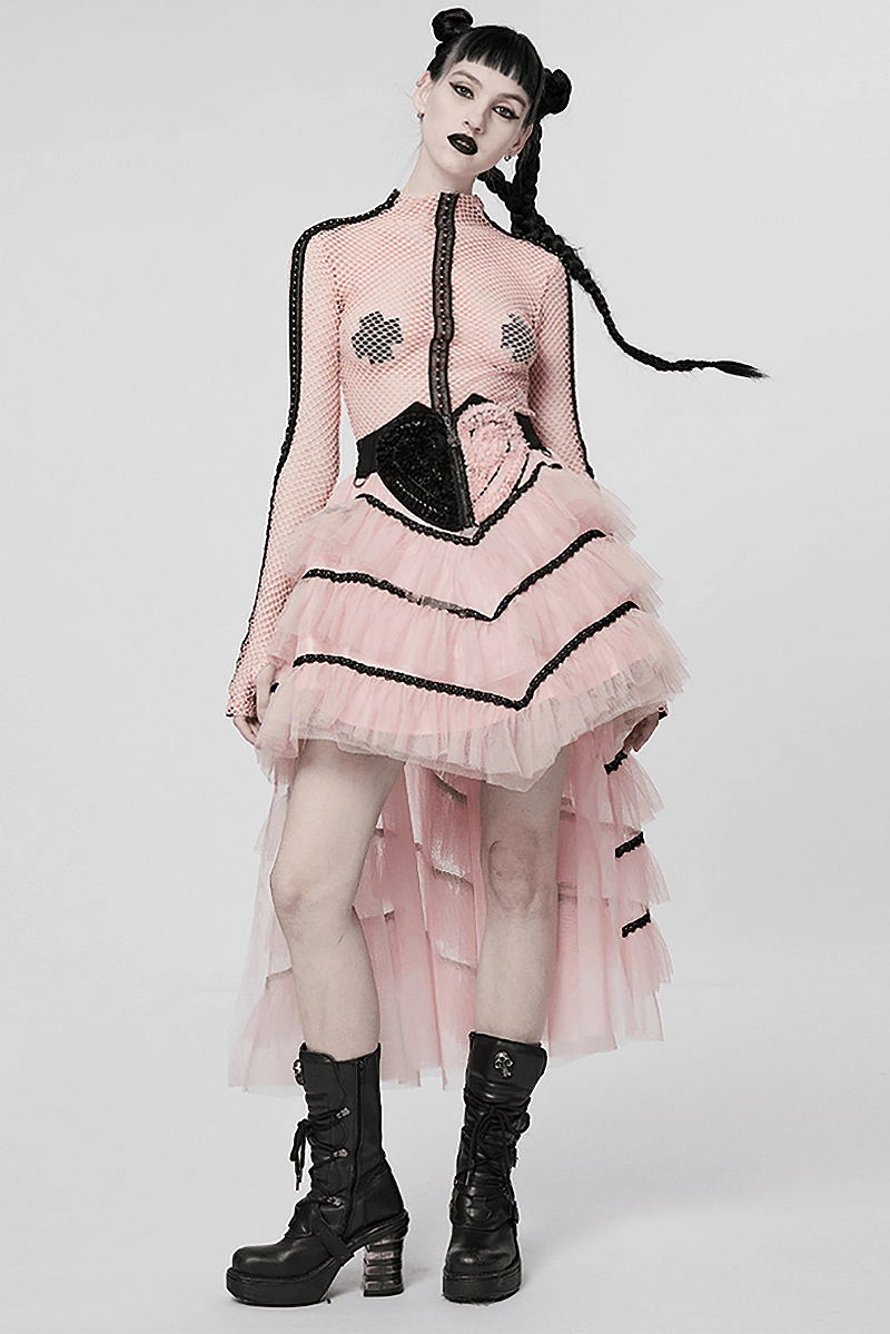 Chic Goth fishnet top paired with a layered pink skirt and combat boots, showcasing an edgy punk style.