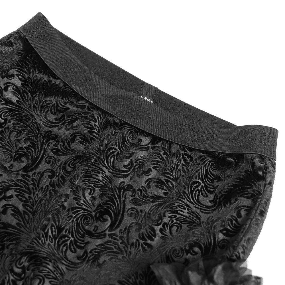 Alt Tag: Chic Gothic Flocked Wide Leg Pants with Lace Panels close-up of black flocked scroll fabric and high waist band, Victorian drama