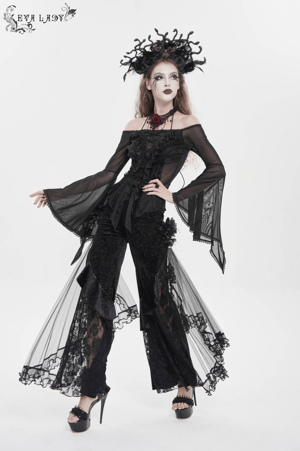 Alt Tag: Chic Gothic Flocked Wide Leg Pants with Lace Panels on model, black Victorian palazzo trousers with lace and mesh ruffle drape, high waist