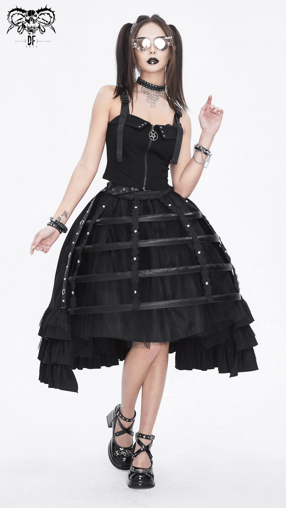 Chic gothic punk open front ruffle hem half skirt with buckle belt by fashionable model, exuding edgy elegance.