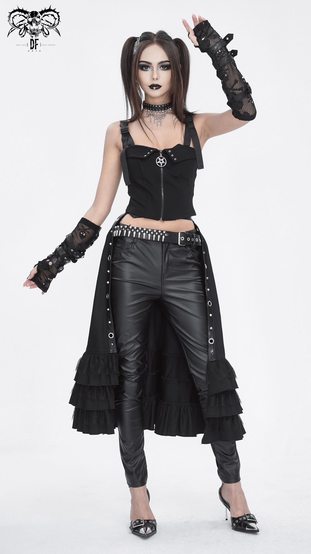 Chic gothic punk fashion featuring ruffled hem half skirt, stylish black ensemble, and bold accessories for a striking look.