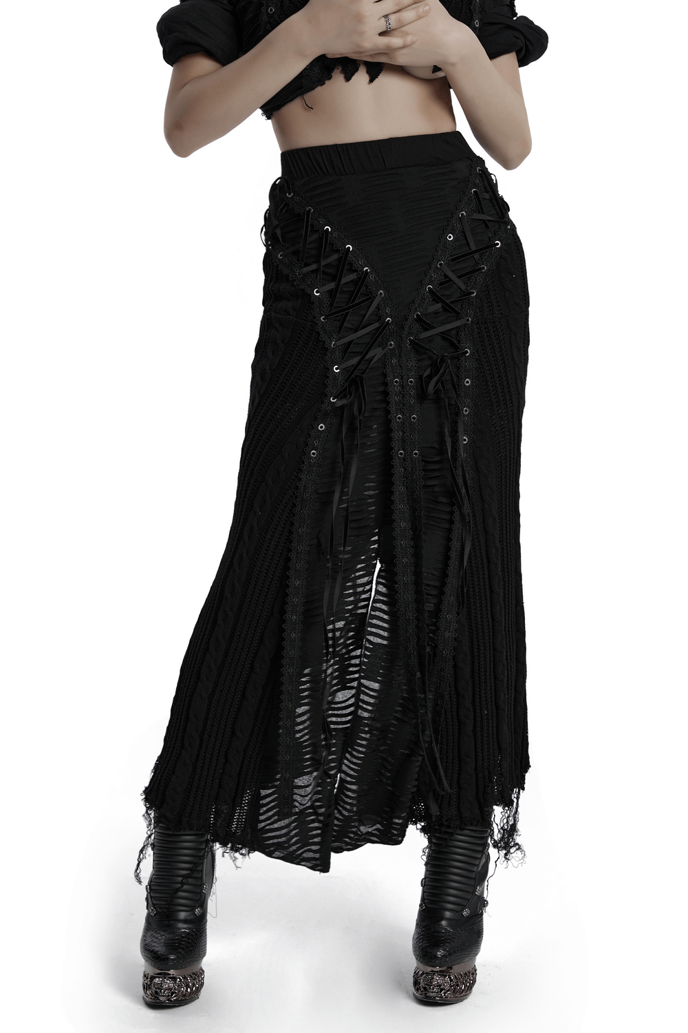 Chic gothic tattered knit skirt with lace-up details and frayed hemline for an edgy style.