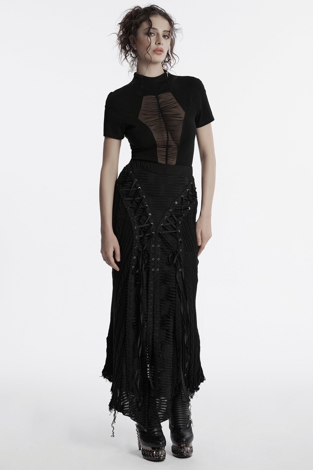 Chic Gothic tattered knit skirt with lace-up details and distressed textures for a rebellious style.