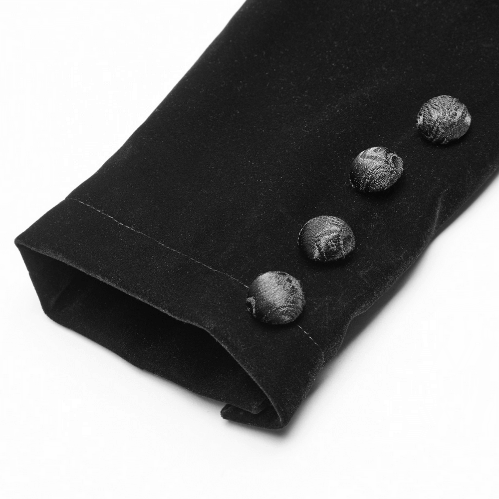 Elegant black velvet coat cuff featuring ornate Gothic buttons for vintage charm and style.