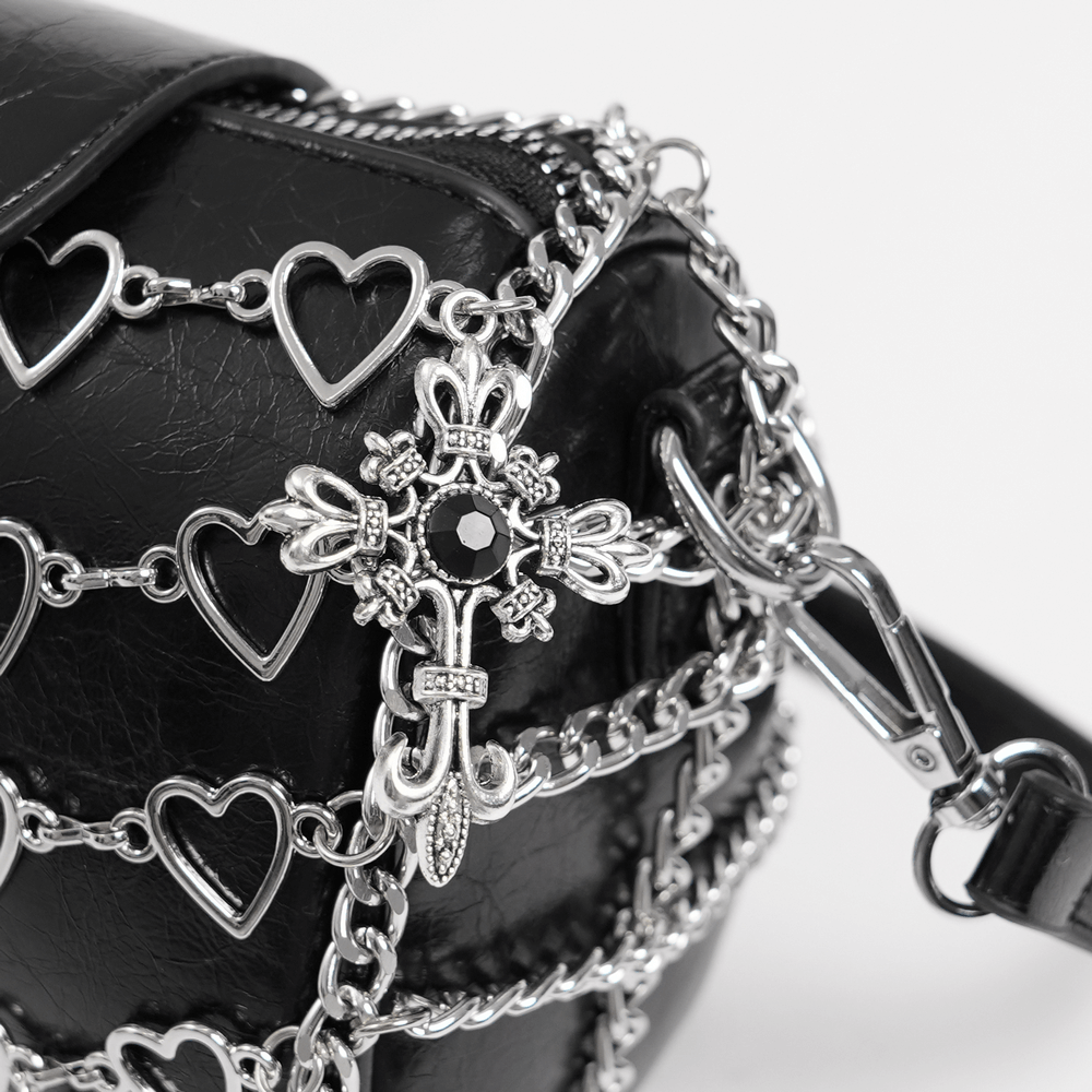 Chic black crossbody bag adorned with heart-patterned chain and metallic accents, perfect for stylish outings.