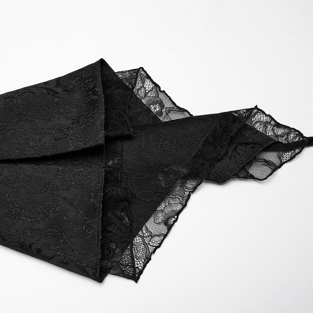 Chic high-low tailcoat fabric featuring elegant jacquard lace in rich black tones.