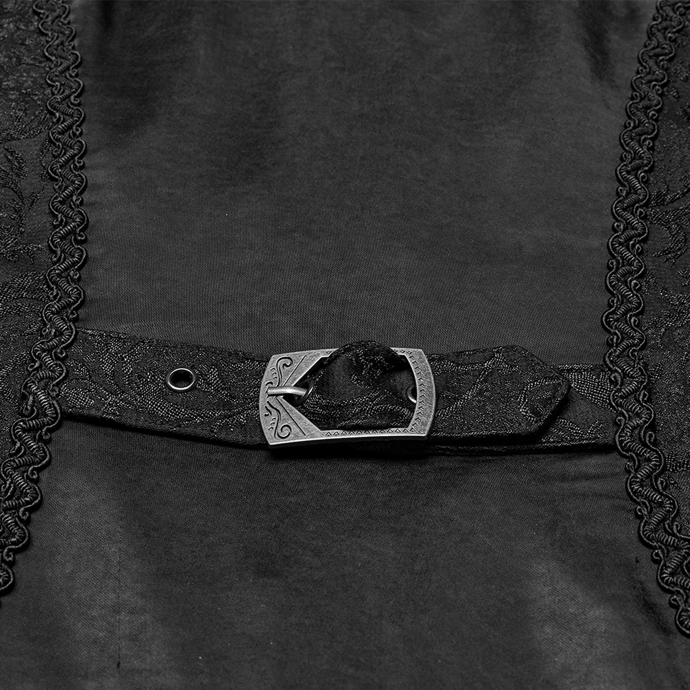 Close-up of a chic black lace tailcoat belt with decorative buckle, perfect for elegant outfits.