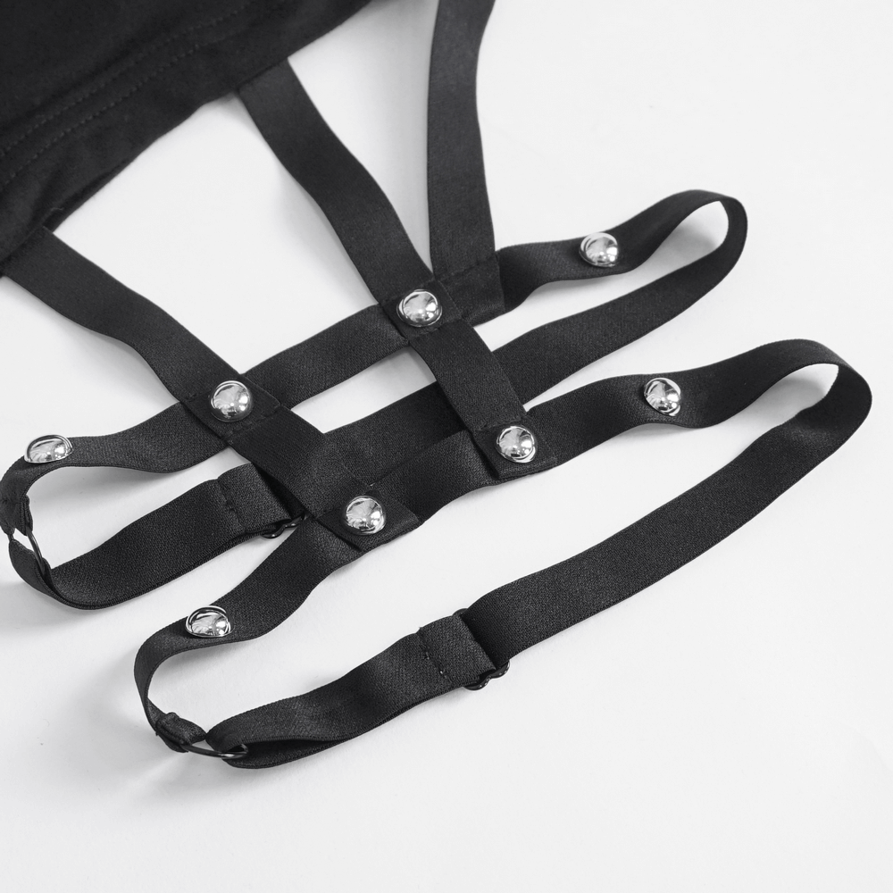 Close-up of chic black garter straps with rivets, perfect for bold women's fashion shorts.