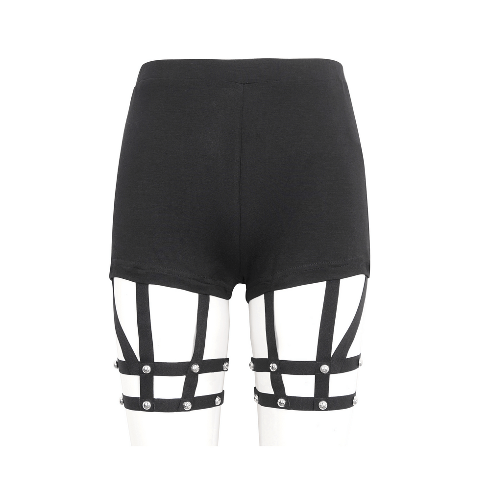 Chic high-waisted black garter shorts with rivet detailing for a bold, trendy look.