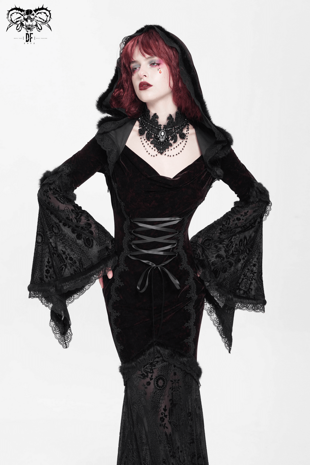 Chic gothic hooded maxi dress with lace sleeves, corset waist, and a dramatic silhouette for alternative fashion.