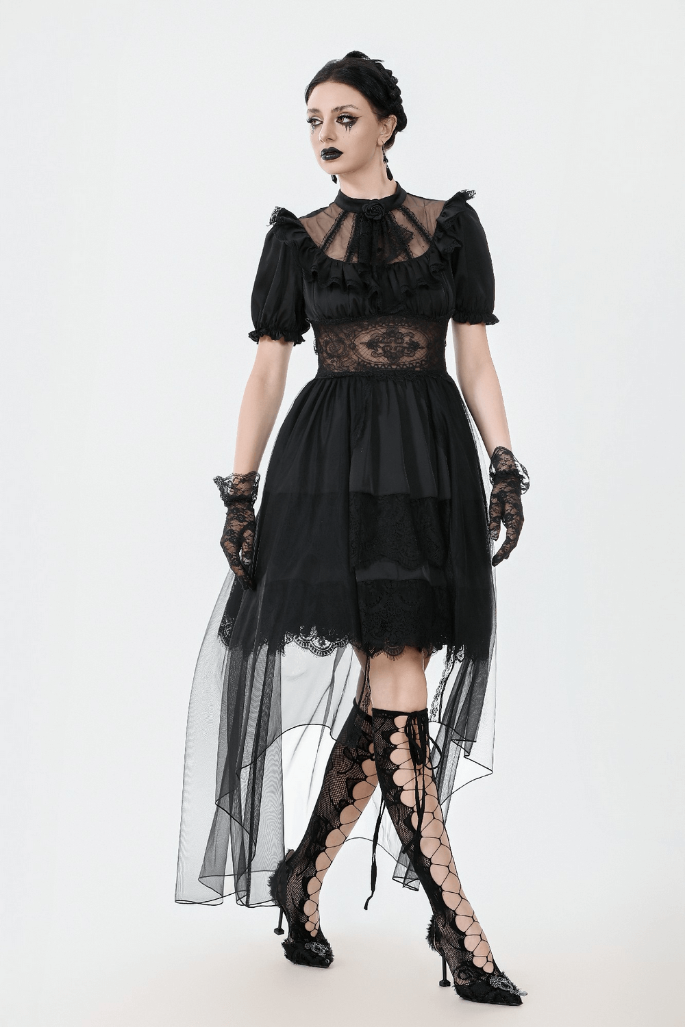 Chic women's gothic dress in black lace and satin with puff sleeves, sheer skirt, and corset back detail.